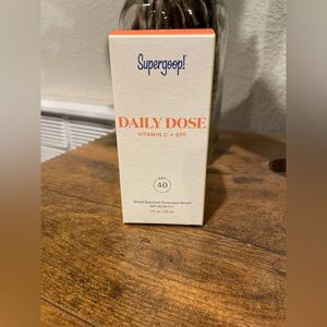 Unopened, unused bottle of Supergoop Daily Dose Vitamin C + SPF 40